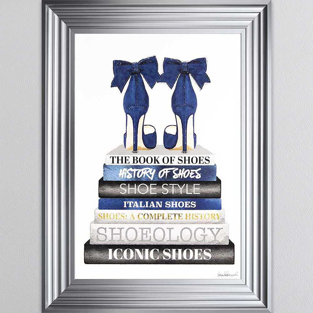 Navy Shoes On Book Stack